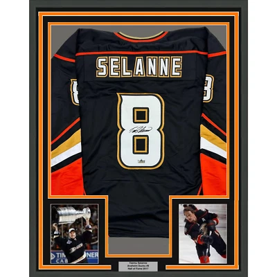Camiseta deportiva enmarcada facsímil autografiada Teemu Selanne 35x39 Anaheim negra reimpresión Foto 1 de 2