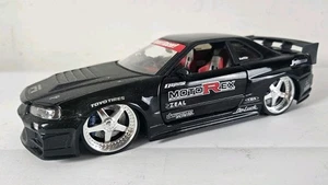 Jada Toys 1:24 Import Racer Nissan Skyline R34 GTR NEGRO LEER  - Imagen 1 de 8