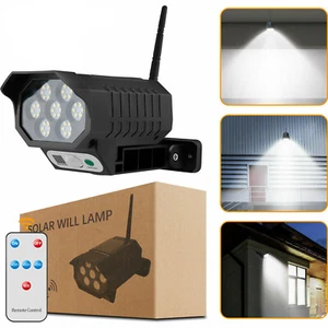 LED Solar Wall Light Motion Sensor Outdoor Security Fake Camera Remote Lamp - Picture 1 of 12