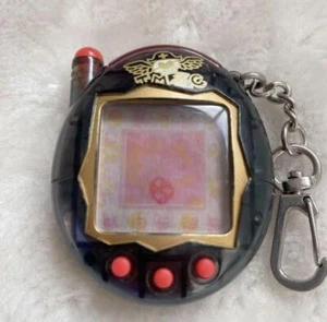 BANDAI Celebration Keitai Kai Two Tamagotchi Plus Red series Piratas Negro Japón - Imagen 1 de 7