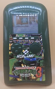 1989 Konami: Teenage Mutant Ninja Turtles 3: Shredder's Last Stand Handheld Game - Picture 1 of 2