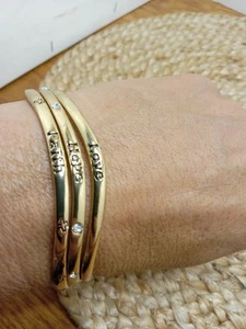 3 Pulseras Tono Dorado Esperanza Amor Fe Con Dije Cruz - Imagen 1 de 9