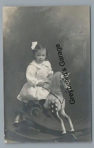 RPPC Cute Baby Girl on ROCKING HORSE WANGANUI NZ New Zealand Real Photo Postcard - Picture 1 of 2