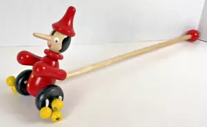 PINOCCHIO Wooden Bright Colored Push Toy Character with Wheels & Noise Makers - Picture 1 of 15