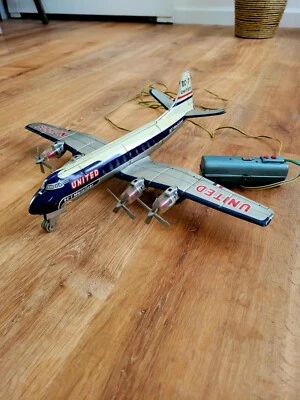 Avión de control remoto Nomura Tin Toys Japón DC-7 United Mainliner N31225  Foto 1 de 4