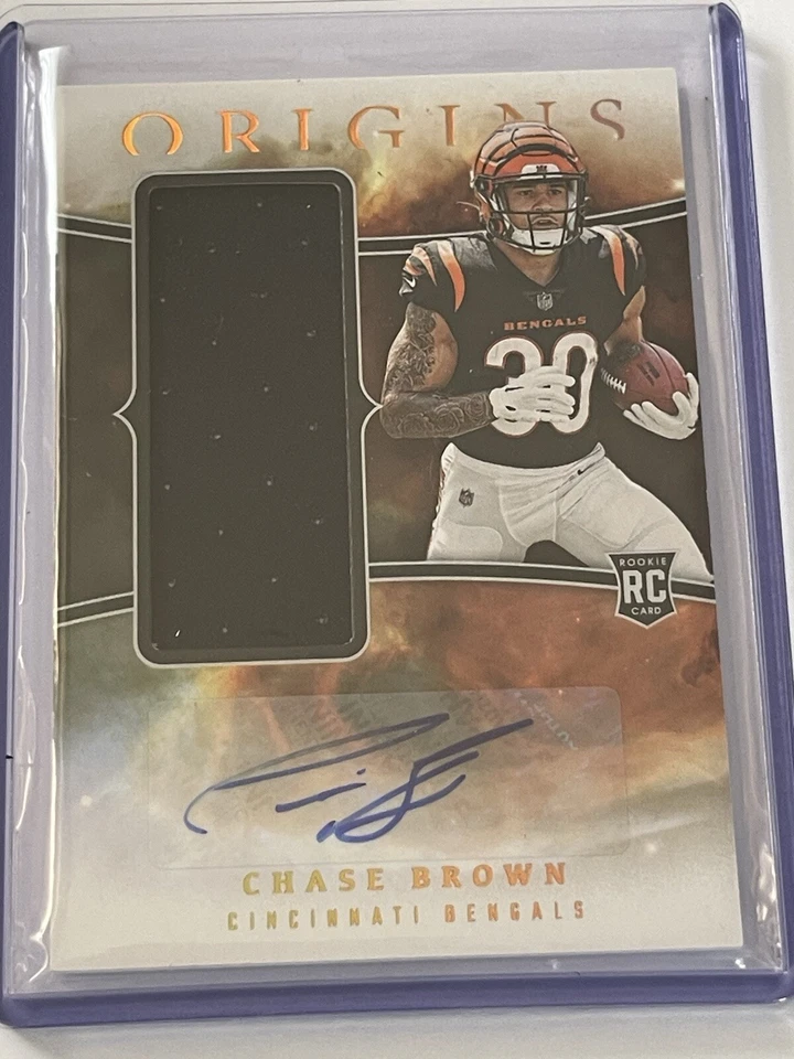 2023 Panini Origins Chase Brown Rookie Patch Auto RC  Bengals - Image 1 of 4