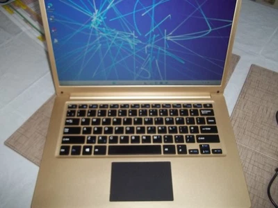 ENTITY ROVE-GOLD NOTEBOOK HW277 GOOD CONDITION 4GB 64 GB eMMc (SSD) + EXTRAS [2] - Image 1 of 4