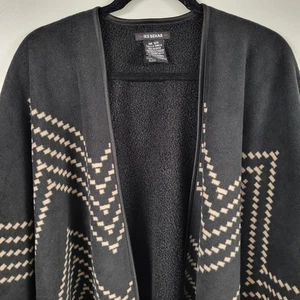Poncho IKE BEHAR nero beige motivo geometrico reversibile in pile taglia unica - Foto 1 di 10