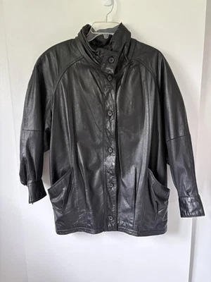 Chaqueta abotonada vintage de cuero negra con bolsillos Foto 1 de 4