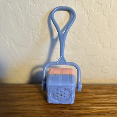 Caja giratoria vintage de plástico duro para bebé sonajero rosa y azul Foto 1 de 4