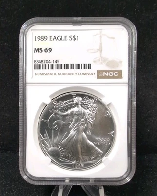 1989 $1 Silver American Eagle NGC MS 69 Classic Brown Label 5793 - Image 1 of 2