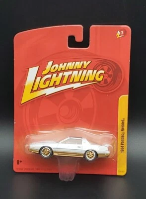 2010 Johnny Lightning Forever 64 JL1 1984 PONTIAC FIREBIRD White-Gold  - Image 1 of 4