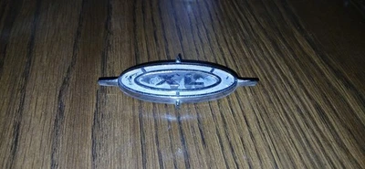 Ford Galaxie 500 XL 1963 emblema de bandeja de paquetes Foto 1 de 2