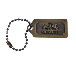 Cartellino da appendere per carrozza in ottone vintage Coach per borsa - Foto 1 di 2
