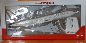 Herpa SnapFit 613873 Philippine Airlines Boeing 777-300ER - RP-C77773 1:200 NEU - Picture 1 of 2
