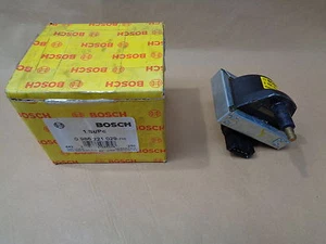 NEW GENUINE BOSCH 0986221029 IGNITION COIL CITROEN AX XM ZX PEUGEOT PARTNER 106 - Picture 1 of 3