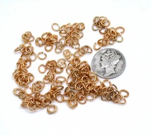 144 6x4 GOLD PLATED OVAL JUMP RINGS - Picture 1 of 1