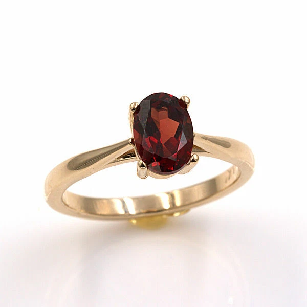 Natural Mozambique Garnet 14KT Yellow Gold 7x5mm Oval Ring (Sizes 4-9) - Image 1 of 2