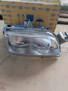 FIAT PUNTO GT CABRIO Headlight HELLA 1AF 006 827-181 - Picture 1 of 6