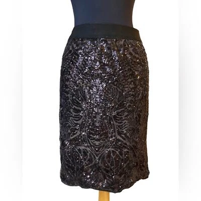 Falda lápiz BCBG negra forrada con lentejuelas cintura elástica talla mediana Foto 1 de 4