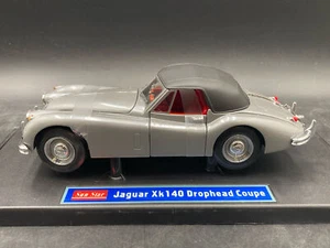 Sunstar 1/18 Jaguar XK140 Drophead Coupè pressofuso con espositore - Foto 1 di 9