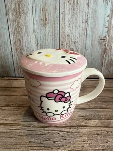 Taza de café de cerámica Hello Kitty con tapa rosa a rayas gráfico nunca usada - Imagen 1 de 9