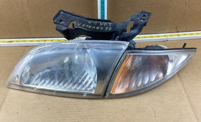 Conjunto de faros laterales izquierdo Chevrolet Cavalier 2000-2002 22666740 OEM Foto 1 de 4
