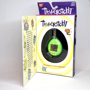 Tamagotchi Green/Yellow Bandai 1997 New Unopened Virtual Pet (A) - Picture 1 of 12