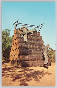 San Antonio TX Lackland Air Force Base Soldiers Scaling Obstacle Course Postcard - Picture 1 of 4