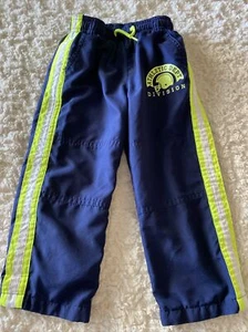 Pantalones deportivos Healthtex para niños azul marino amarillo neón 2T - Imagen 1 de 8