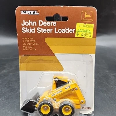 1/64 ERTL John Deere Skid Steer Loader #5536 NIP - Image 1 of 4