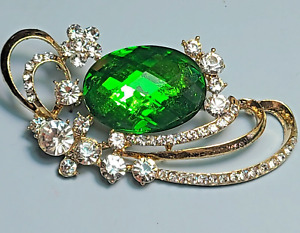 Brooch rhinestone and faceted  resin green stone  2 inches