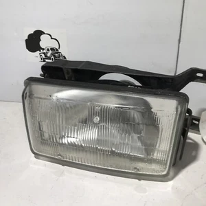 1988 Hyundai Excel Headlight + Bracket LH Driver Side OEM PN 92181-21150 - Picture 1 of 8