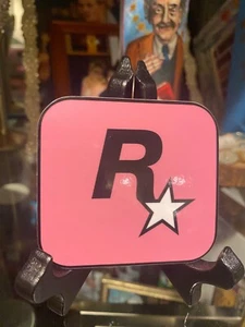 Grand Theft Auto V 5 Rockstar Games LOGO Sticker Decal Pink 3" x 3 1/16" - Picture 1 of 1