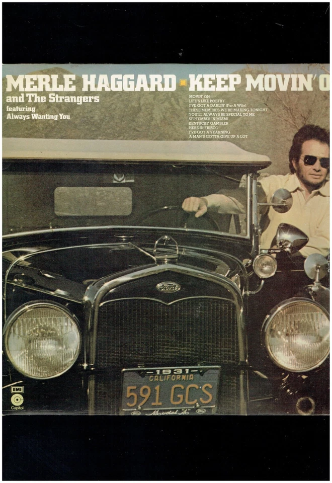 MERLE HAGGARD AND THE STRANGERS KEEP MOVIN' ON 1975 VINYL  ALBUM - Image 1 of 1