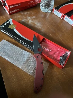 Spyderco Delica St. Nick's Exclusive Black TiCN HAP40/SUS410 Red G10 C11GPRDBKE - Image 1 of 4