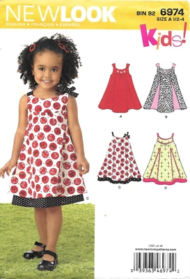 Uncut New Look Sewing Pattern 6974 Toddler's Sleeveless Tieback Dress Size 1/2-4 - Image 1 of 2