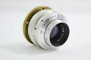 OBIETTIVO FOTOCAMERA VINTAGE ARGUS C-FOUR 50MM F2.8 RIVESTITO CINTAR CON FLANGIA OTTONE - Foto 1 di 5