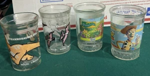 4 Jelly Jar Glass TOY STORY #1 Disney, DRAGON TALES, 2 1988 DINOSAURIO, GALCHs y BAMA - Imagen 1 de 9