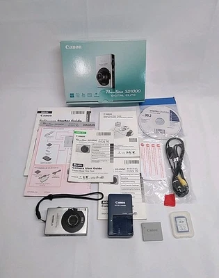 Cargador de batería para cámara Canon PowerShot SD1000 digital Elph plateado 7,1 MP PROBADO Foto 1 de 4