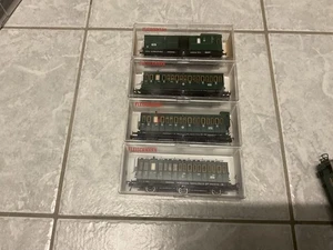 4 Fleischmann H0 3-Achs Personenwagen 2x 5092, 5094, 5095 mit Licht in OVP - Bild 1 von 4