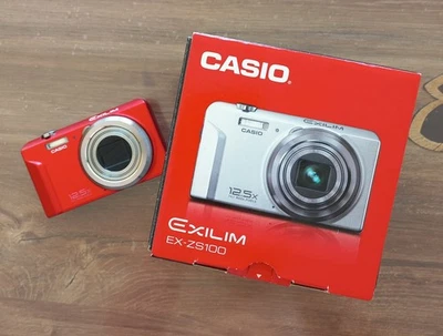 Eine Kamera Casio Exilim EX-ZS100 - Bild 1 von 2