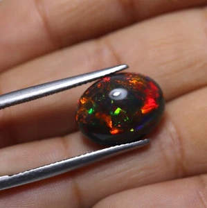 4.6 Cts 14.1x11 MM Real AAA Multi Fire Smoked Black Ethiopian Opal Oval Cabochon - Picture 1 of 9
