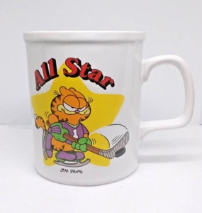 Taza de café de cerámica Enesco 1978 vintage Jim Davis Garfield All Star HOCKEY - Imagen 1 de 9