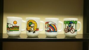 4 VINTAGE FIRE KING ANCHOR HOCKING SNOOPY MILK GLASS MUGS SKATING, PEDAL POWER