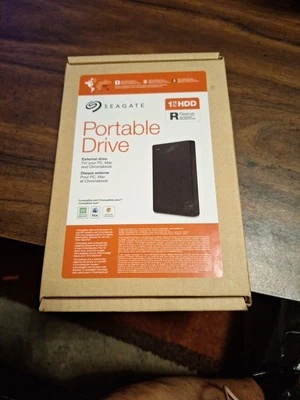 Seagate 1TB External USB 3.0 Portable Hard Drive Black (STGX1000400) - Image 1 of 2