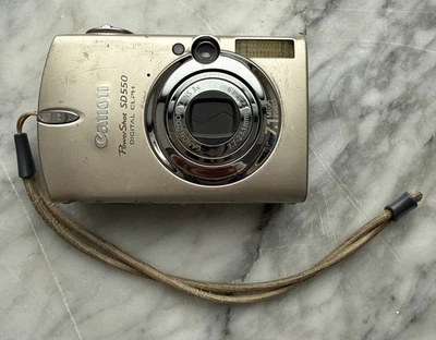 Câmera Digital Canon PowerShot SD550 7.1MP SOMENTE MACRO FUNCIONA LER - Imagem 1 de 4