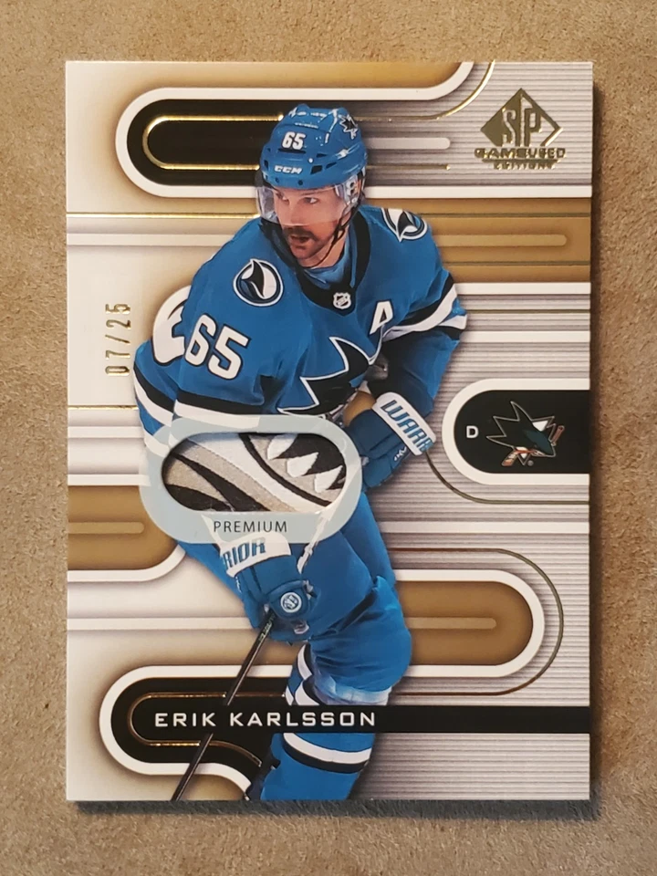 2022-23 SP Game Used - Erik Karlsson #79 Gold /25 Filthy Shark Tooth Patch - Image 1 of 4