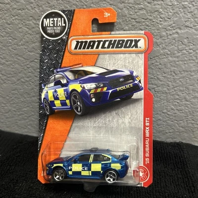 Matchbox 2016 Metal '15 SUBARU WRX STI azul y amarillo policía - nuevo en paquete Foto 1 de 2