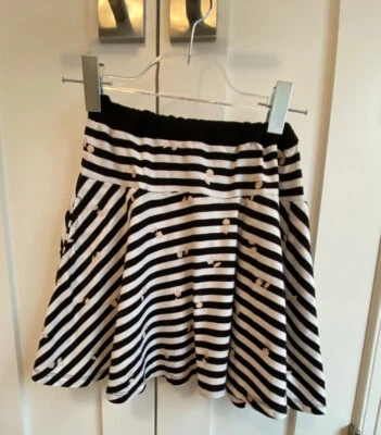 Falda a rayas blancas y negras con cerezas rosas Sonia Rykiel para niñas Foto 1 de 3